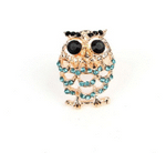 bague en or avec un hibou faux diamant bleu