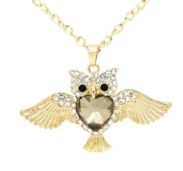 pendentif hibou or signification chouette ailes ouvertes